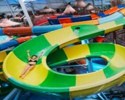 It is a large indoor park with an area covering over 102 thousand square feet. It is a Polynesian-style park with a gigantic wave pool, more than 14 w